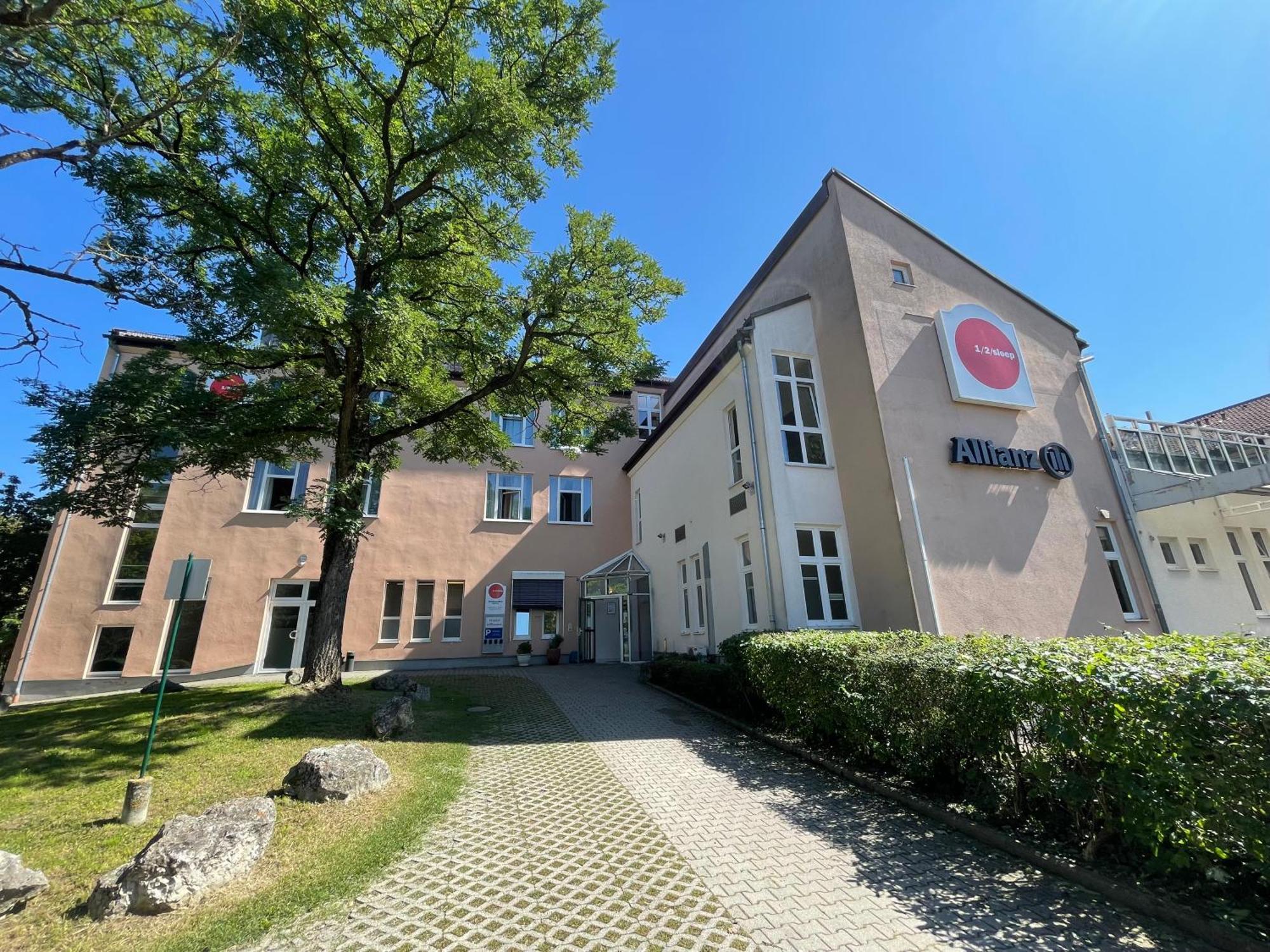 1, 2, Sleep Boardinghouse Unterschleissheim Zentrum Bagian luar foto